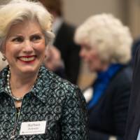 Barbara Hohman smiling at other event attendees